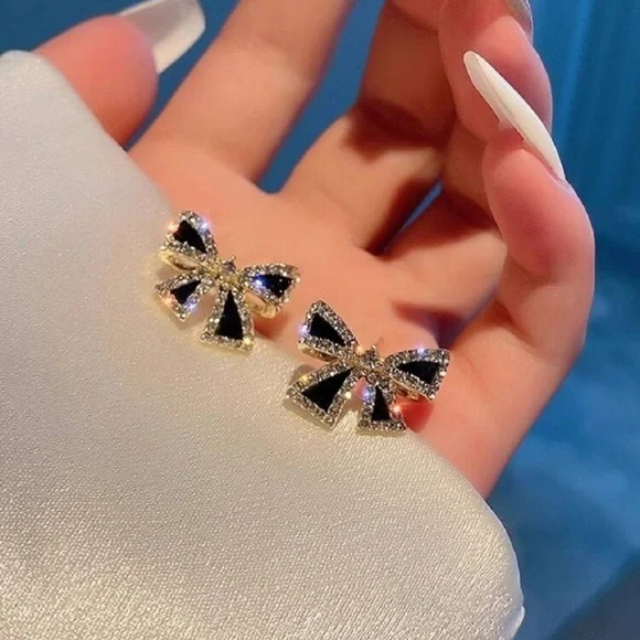 Elegant Black and Gold Bow Earrings - Picture 2 of 4